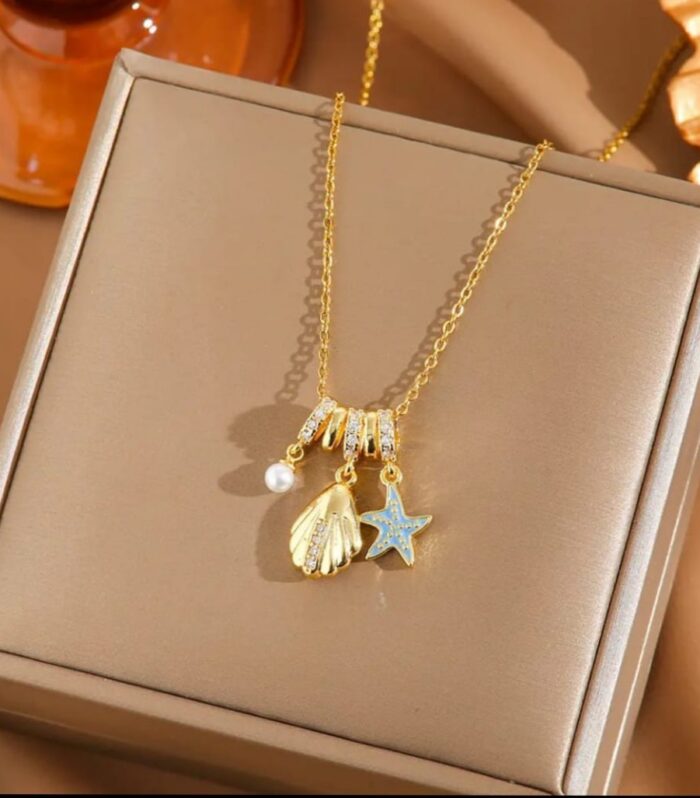Golden Ocean Charm Necklace – A Tribute to Coastal Beauty and Modern Elegance
